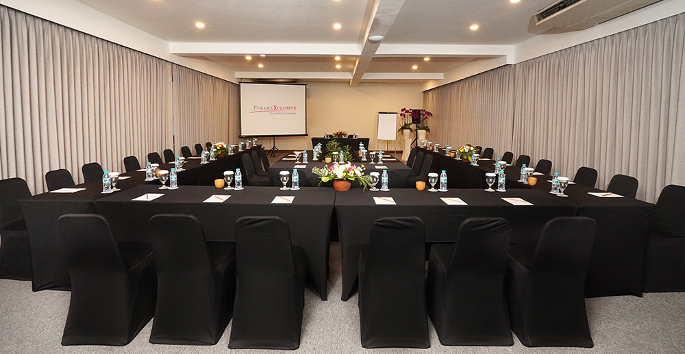 Meeting room with U-shaped table arrangement