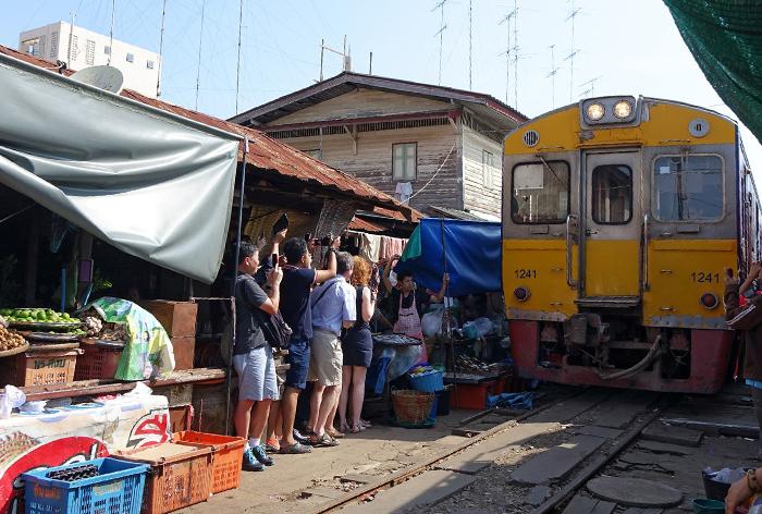 Train in Market with Photographers